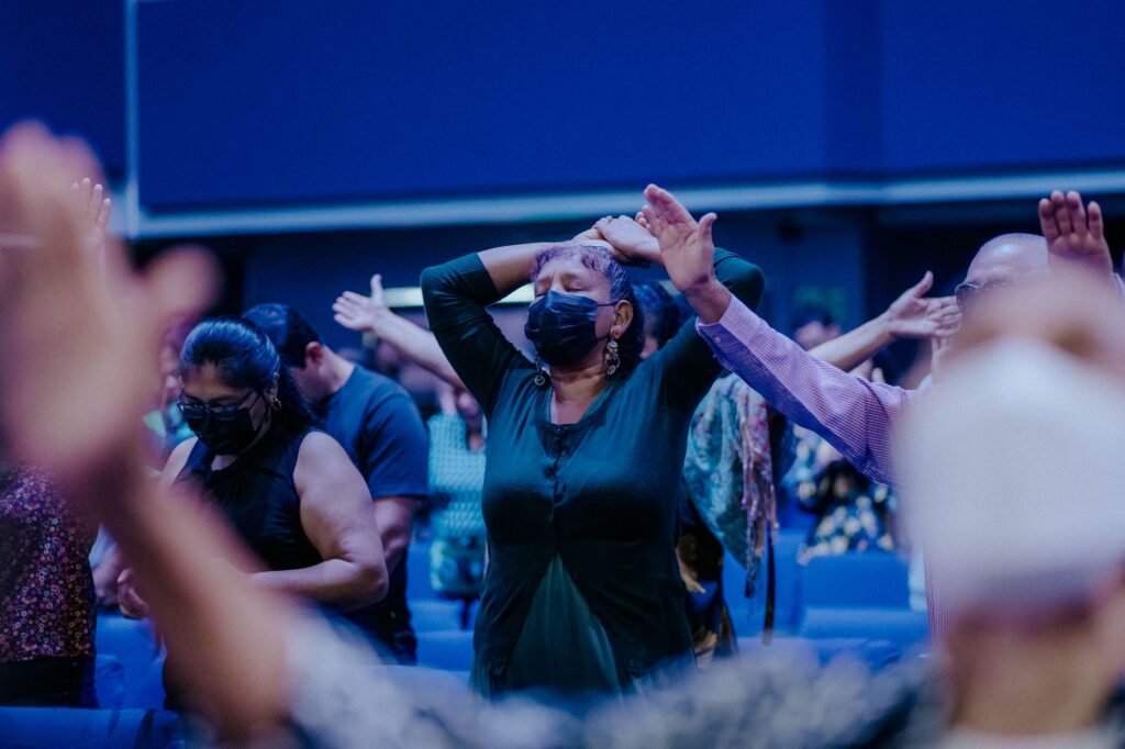 A community gathering for worship highlights the encouragement found in fellowship and collective strength in Christ
