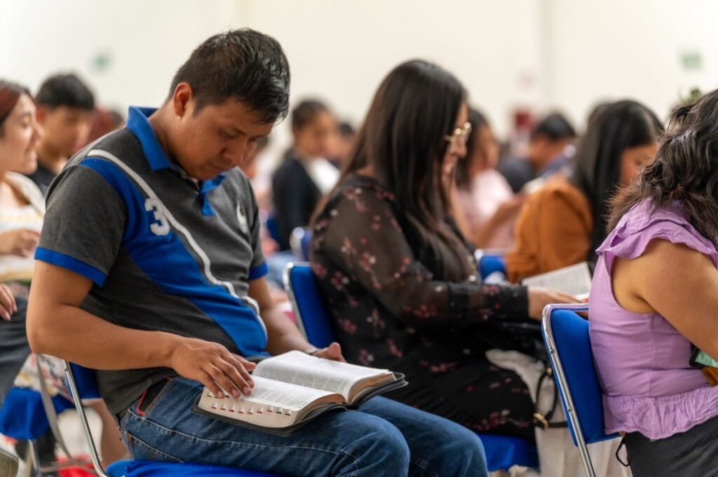 A group engaged in a Bible study, fostering community and support