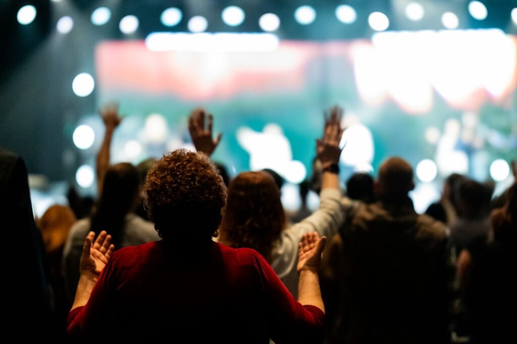 A group in worship creates an atmosphere of encouragement and faith