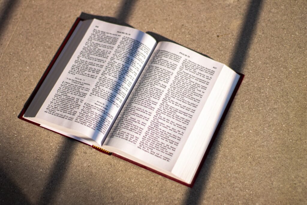 A serene image of an open Bible symbolizing hope and guidance in dark times
