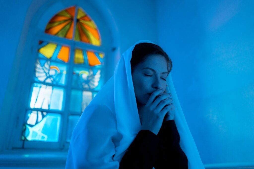 A woman in prayer seeks God's guidance for her life decisions