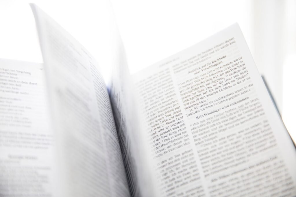 An open Bible in morning light, symbolizing the strength found in Scripture